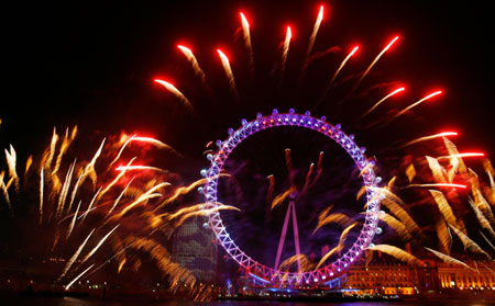 Fireworks explode over the River Thames in London to celebrate the new year January 1, 2007.