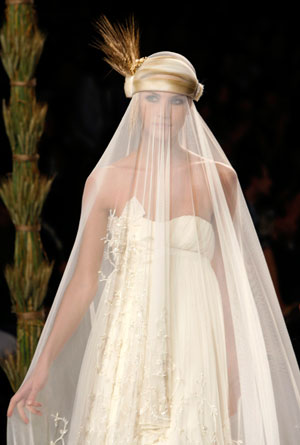 A model presents a creation from Victorio & Lucchino collection at Barcelona Bridal Week fashion show May 30, 2007.