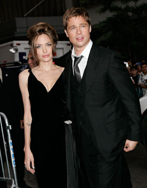 Actors Brad Pitt and Angelina Jolie arrive for the movie premiere of 'A Mighty Heart' in New York, June 13, 2007.