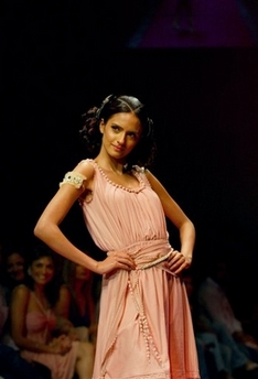 A model presents a creation by designer Surily Goel at the Lakme Fashion Week in Mumbai, India, Wednesday, Nov. 1, 2006.