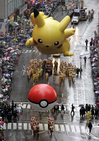 A 'Pikachu' balloon makes its way down Broadway during the Macy's Thanksgiving Day Parade in New York November 23, 2006.