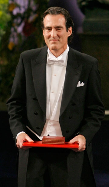 Craig Mello from the United States holds the joint 2006 Nobel Prize for Medicine at the Concert Hall in Stockholm December 10, 2006. The Nobel Assembly at the Karolinska Institute awarded the Nobel Prize in Physiology or Medicine jointly to Craig Mello from the United States and his compatriot Andrew Fire for their discovery of RNA interference - gene silencing by double-stranded RNA.