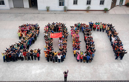 Pupils line up to form the numbers 