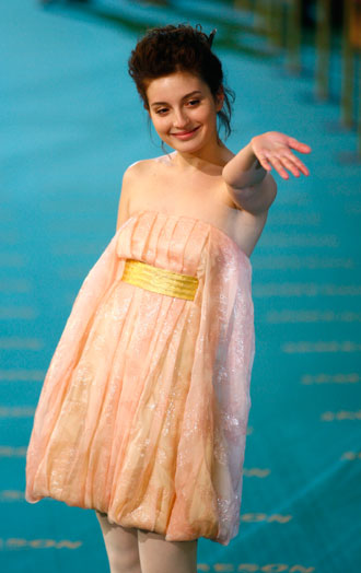 Spanish actress Maria Valverde poses for photographers after her arrival for the Spanish Film Academy 