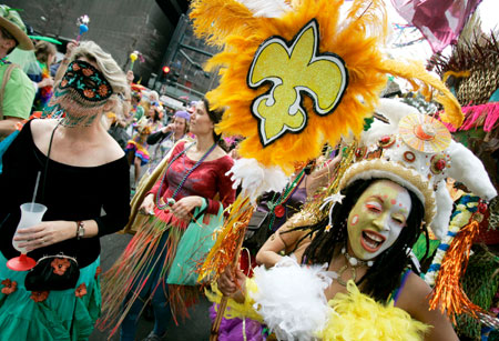 Members of the Mondo Kayo Social and Marching Club parade down St. Charles Avenue Mardi Gras Day in New Orleans, Louisiana February 20, 2007.