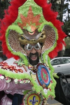 A Mardi Gras masker hits the streets of New Orleans, Tuesday, Feb. 20, 2007, for the day long celebration known as Mardi Gras.