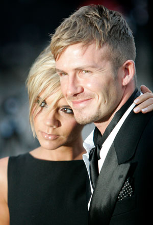 Soccer player David Beckham and his wife Victoria arrive for the Sport Industry Awards 2007 at Old Billingsgate in central London March 29, 2007. The annual industry awards celebrates commercial achievement in British sport.