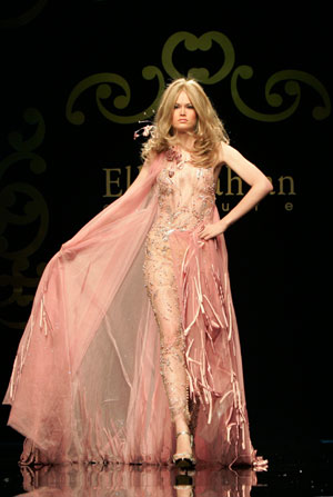 A model displays a creation from Lebanese fashion designer Ella Zahlan's autumn/winter collection in Rome during Rome Fashion Week July 12, 2007.