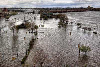 Heavy rains bring raging floods - and a debate