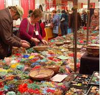 Beaders form jewelry, and a circle of friends