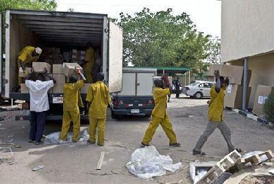 Nigerian President backs election chief despite poll delay