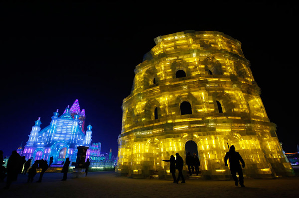 Ice sculptures shine at night in Harbin