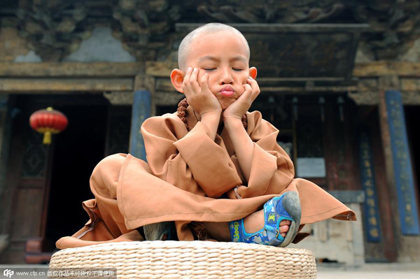 Cute monk causes online stir