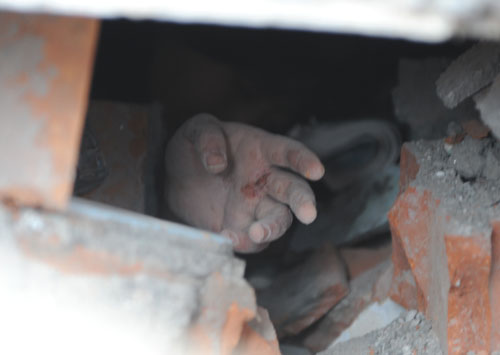 Pray for kids trapped under rubble