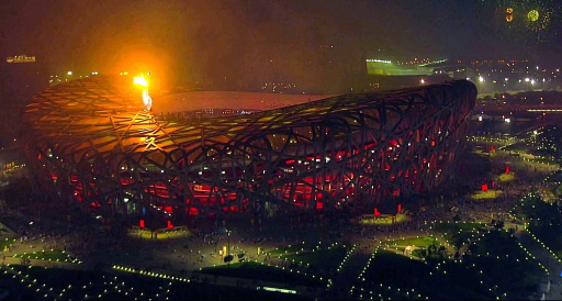 Li Ning lights up Olympic cauldron