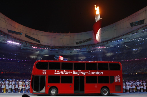 Beijing passes Olympic host baton to London