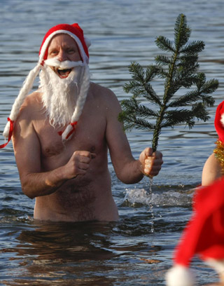 Santas go for ice swimming