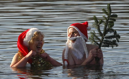 Santas go for ice swimming