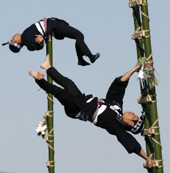 Japanese firefighters show off pole dancing skills