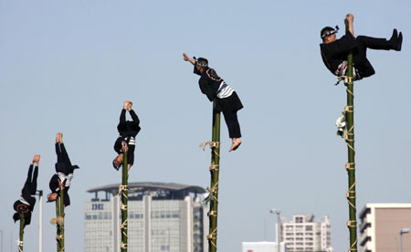 Japanese firefighters show off pole dancing skills