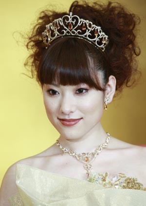 Gold thread made wedding dresses displayed in Japan