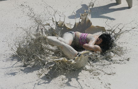 Mud and guts in women's mud wrestling contest