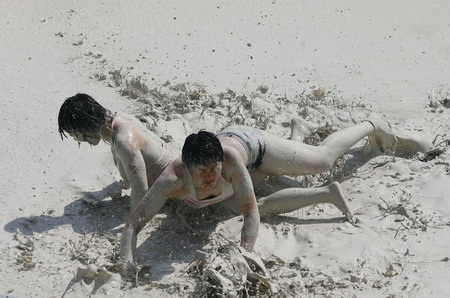 Mud and guts in women's mud wrestling contest