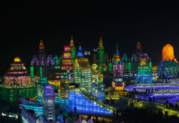 Ice sculptures shine at night in Harbin